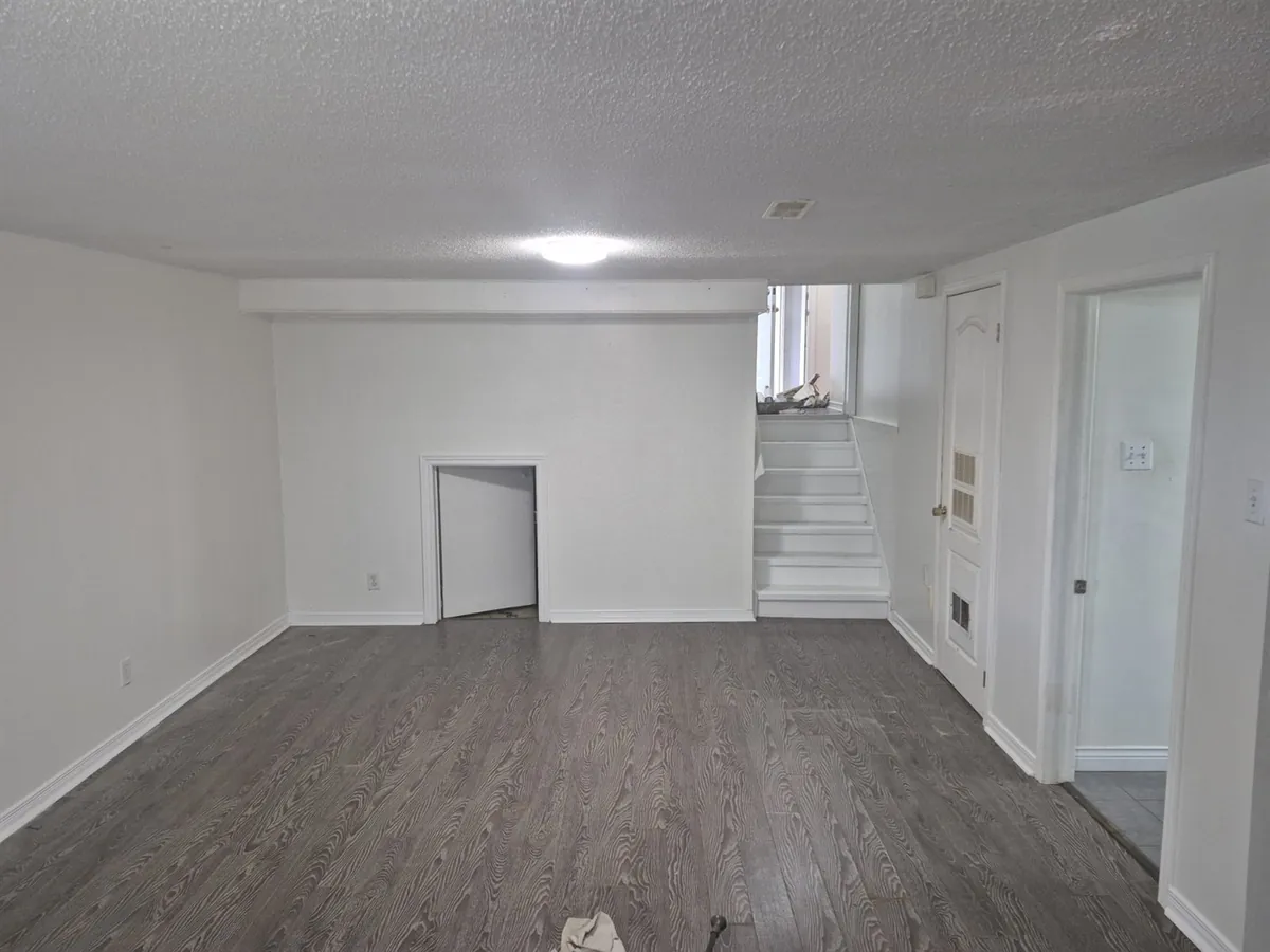 A brighter basement — After · painted walls