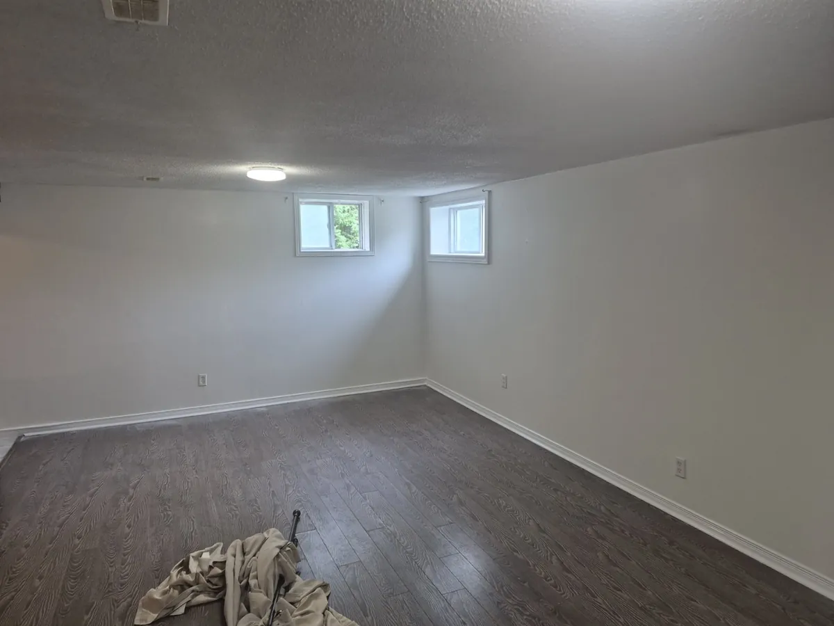 A brighter basement — After · reverse view