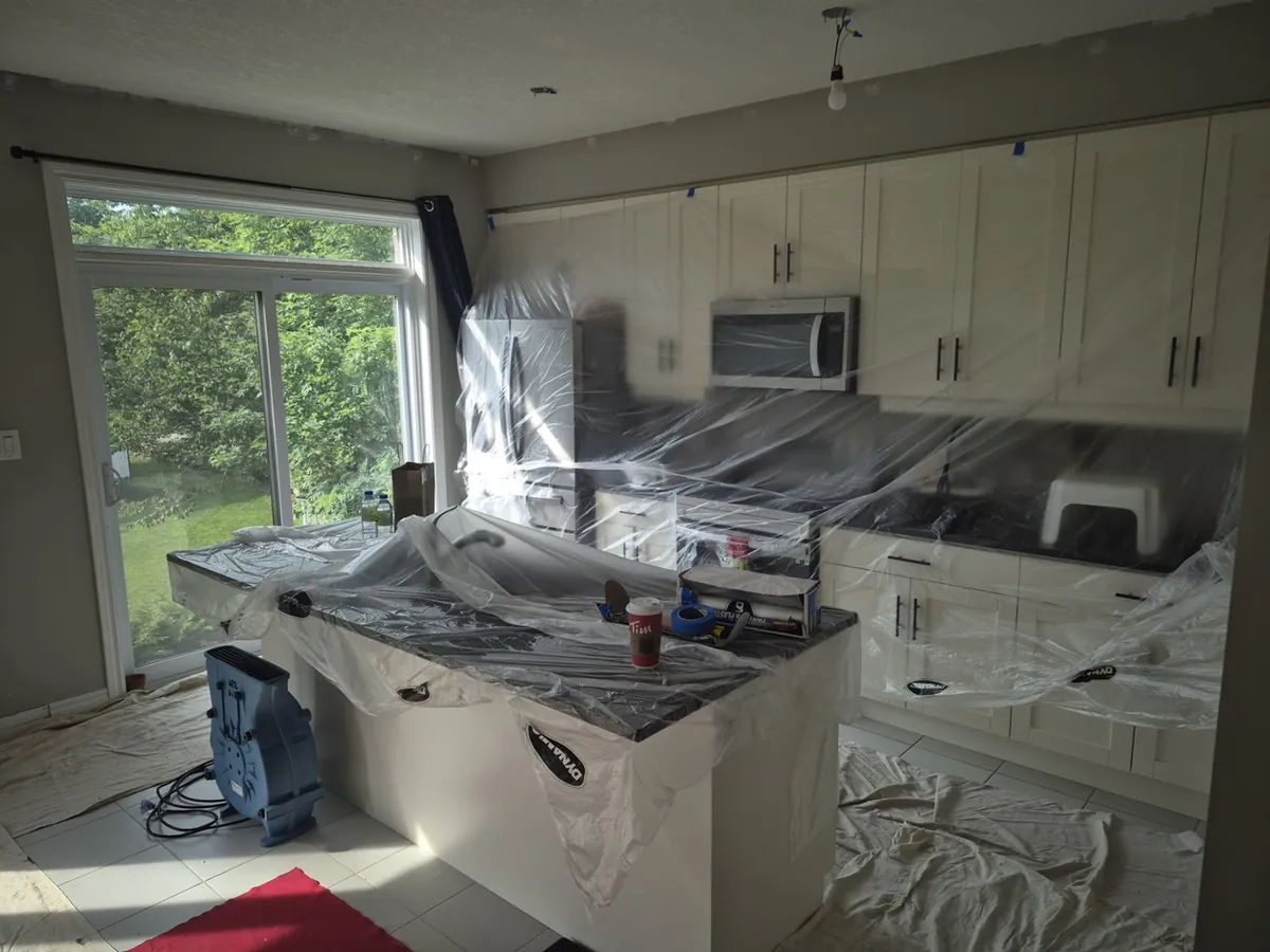 Kitchen and living-area repaint — Kitchen protection