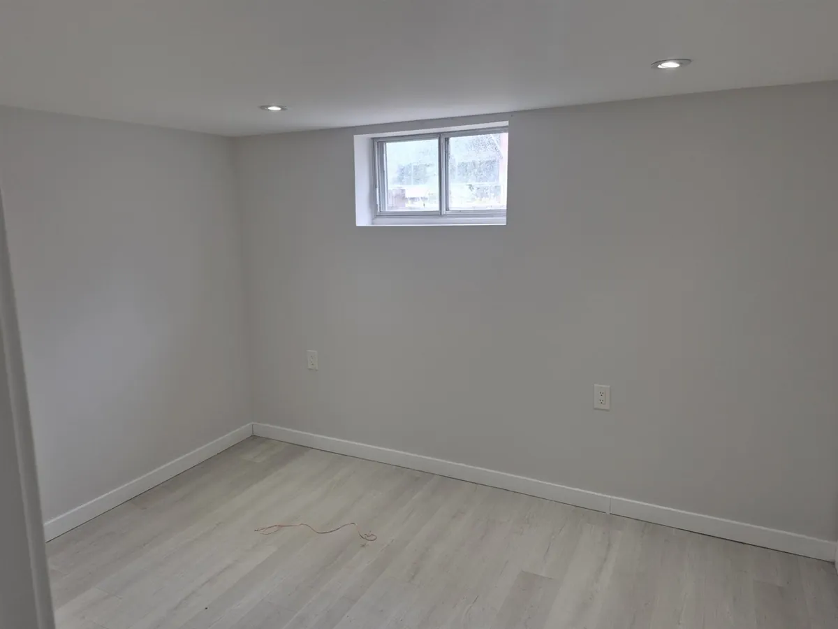 A light, open lower level — Bedroom
