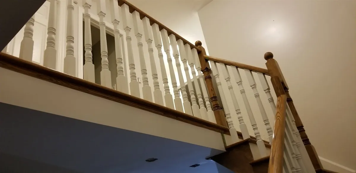 Tall walls, windows and staircase details — Balustrade and trim