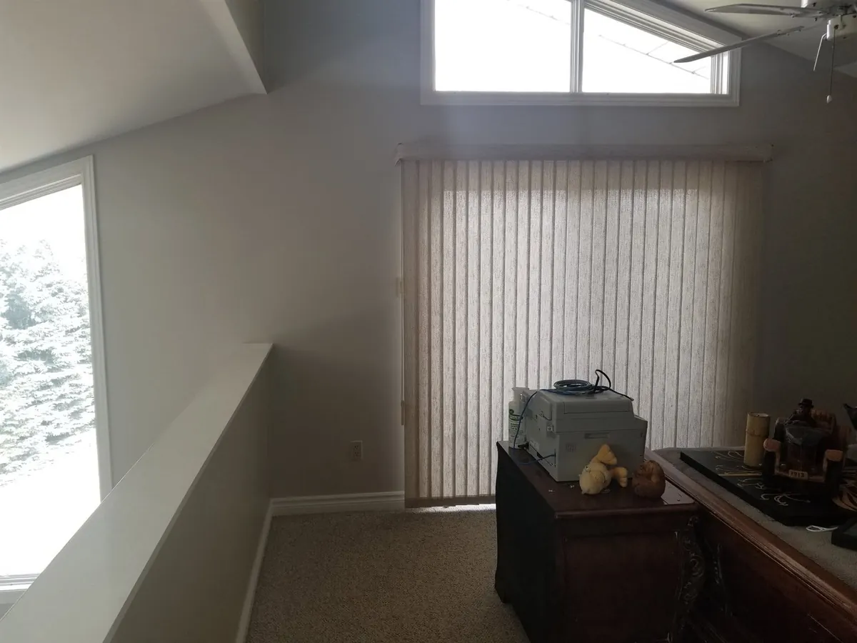 Tall walls, windows and staircase details — High-window detail