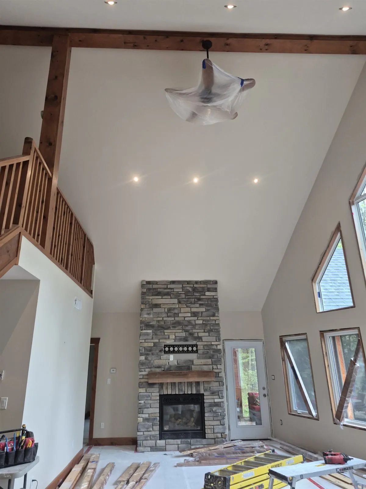 Vaulted interiors, transformed — After painting · ceiling and fireplace
