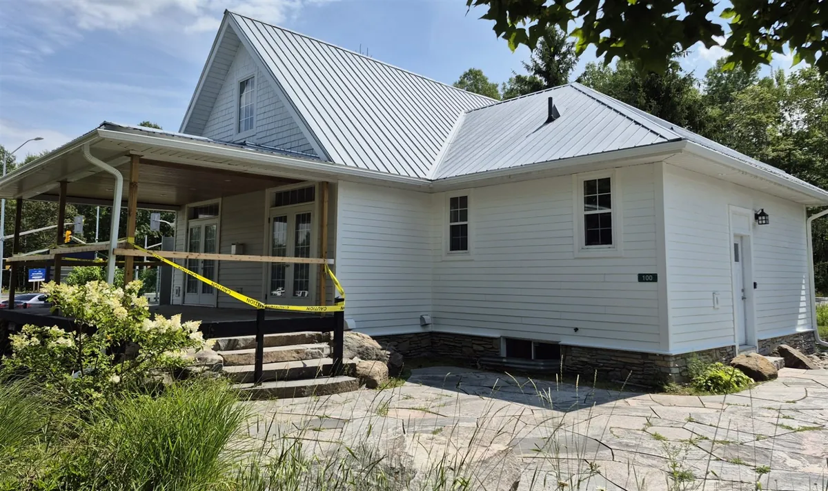 Red siding to a fresh white exterior — After · porch